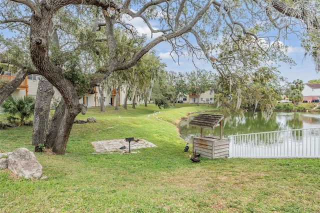 view of yard with a water view