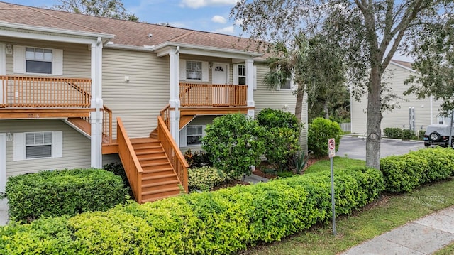 view of front of property with a balcony