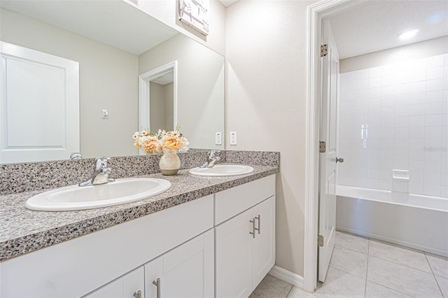 bathroom featuring tile patterned floors, vanity, and shower / tub combination