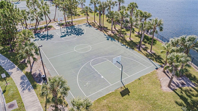 view of basketball court with a water view