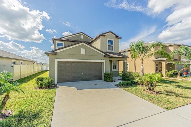 view of front of home with a garage and a front lawn