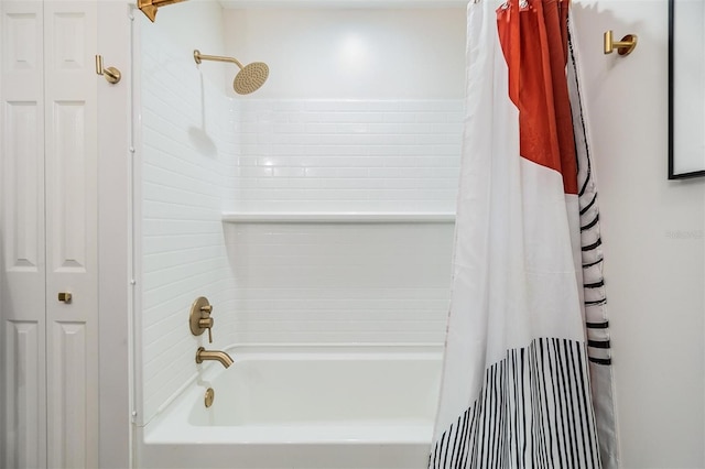 bathroom featuring shower / bathtub combination with curtain