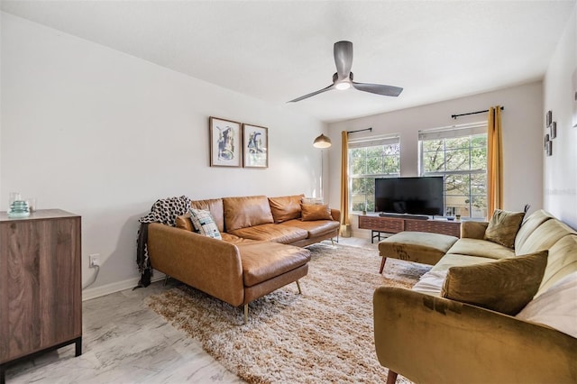 living room with ceiling fan