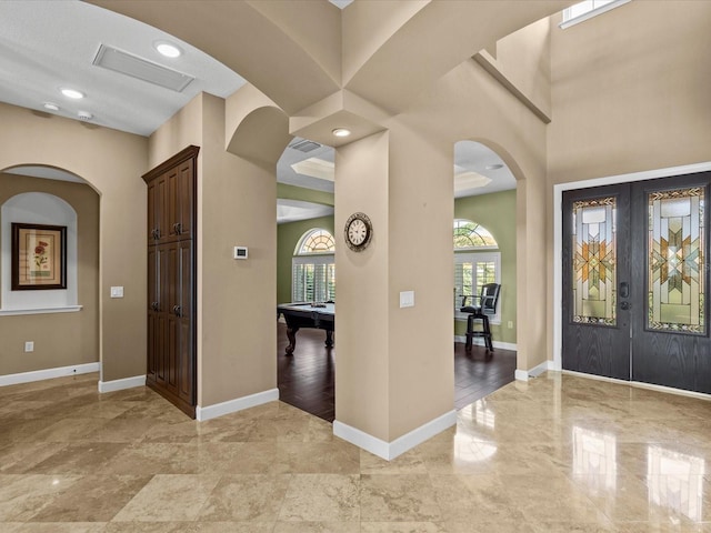 entryway with french doors, pool table, and light wood-type flooring