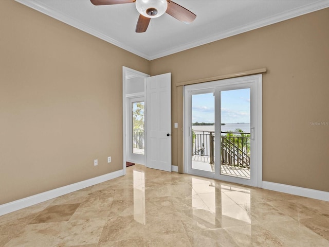 spare room with plenty of natural light, ceiling fan, and ornamental molding