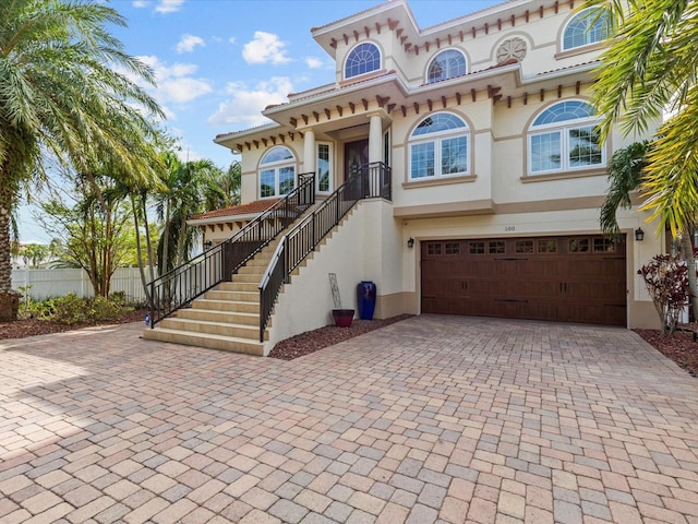 view of front of property featuring a garage