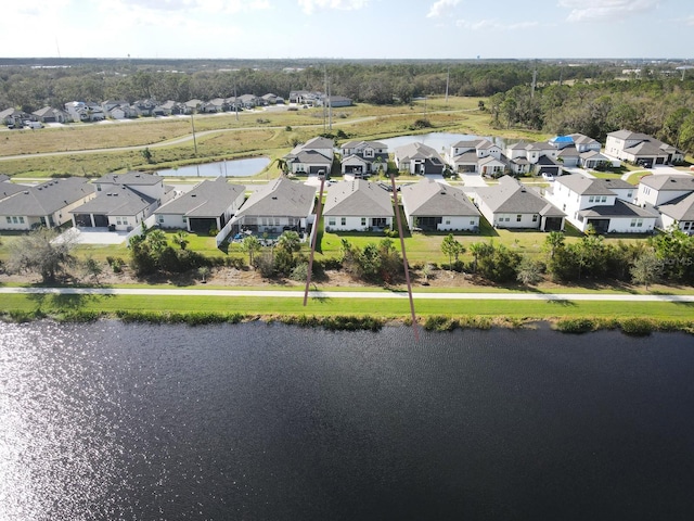 drone / aerial view featuring a water view