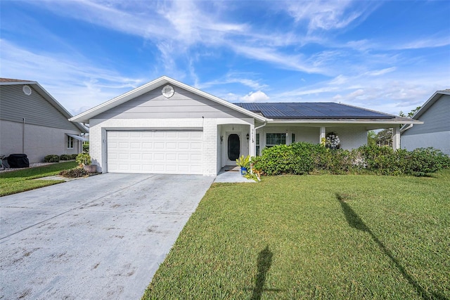 ranch-style home with a garage and a front yard