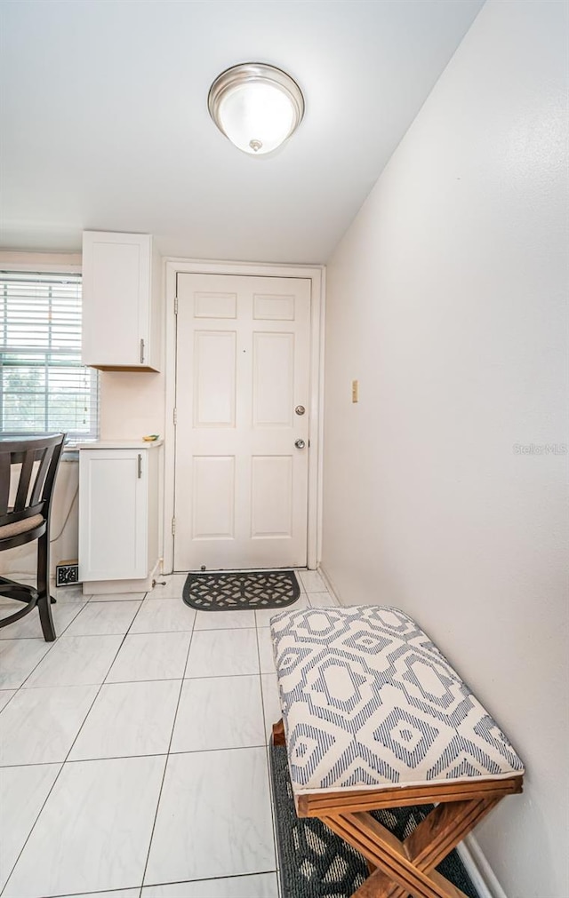 view of tiled foyer