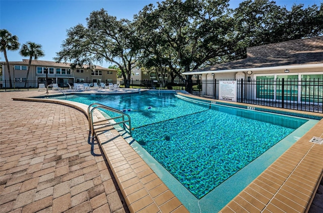 view of pool featuring a patio