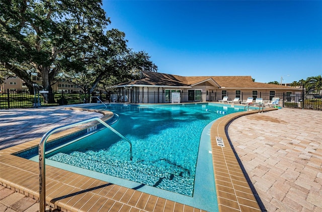 view of pool featuring a patio area