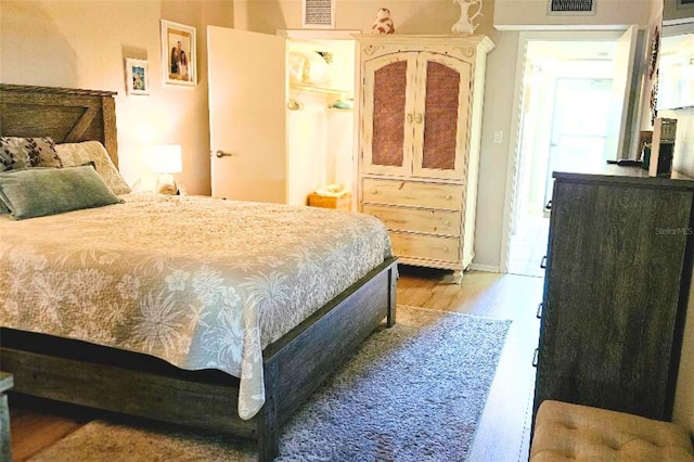 bedroom featuring hardwood / wood-style floors