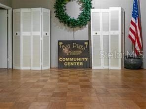 interior space with parquet flooring