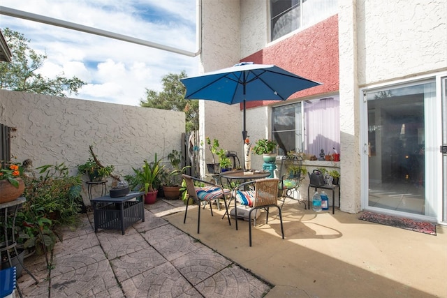 1827 Pine Cone Cir, Clearwater, FL 33760 - fenced backyard with outdoor dining space and a patio