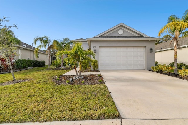 ranch-style house featuring a garage and a front yard