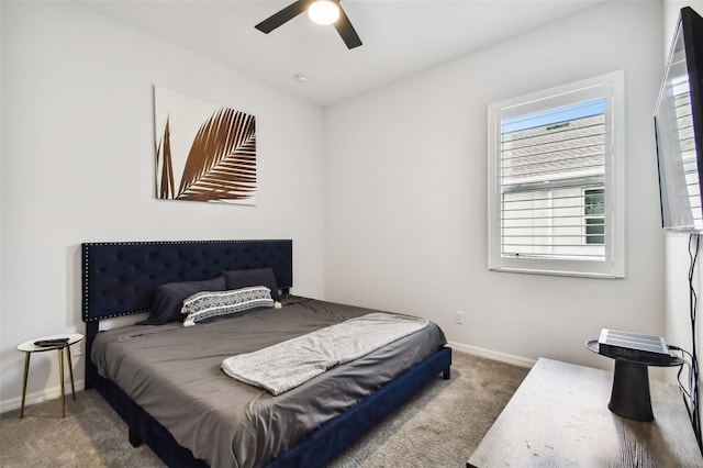 bedroom featuring ceiling fan and carpet floors