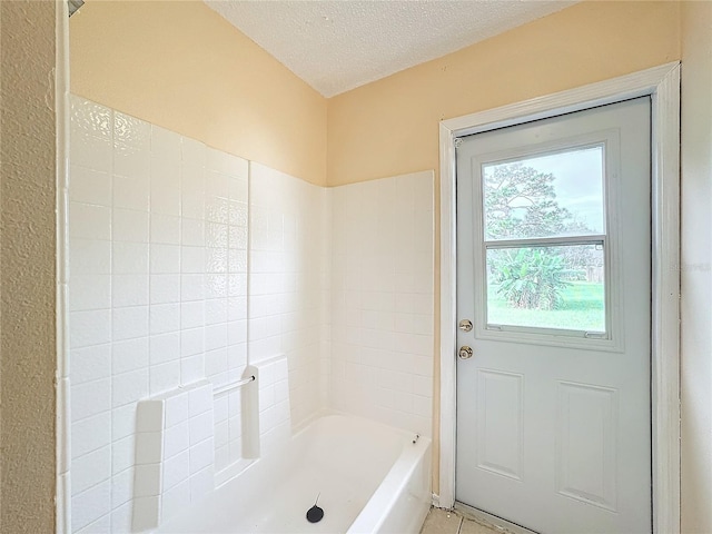 bathroom with a textured ceiling