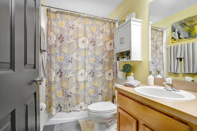 full bathroom with shower / bath combo, toilet, vanity, and tile patterned floors