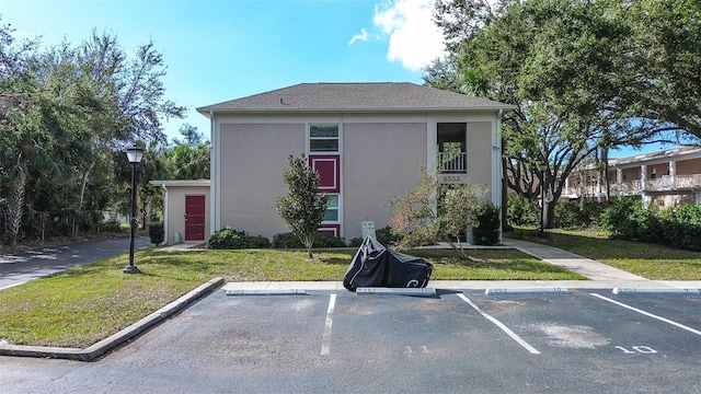 exterior space featuring a front yard