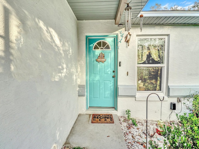 5800 W Spicey Hill Dr, Homosassa, FL 34448 - view of exterior entry with stucco siding