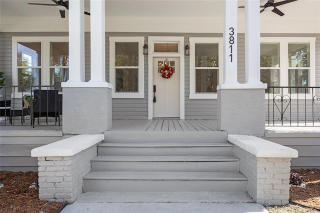 property entrance featuring a porch and ceiling fan