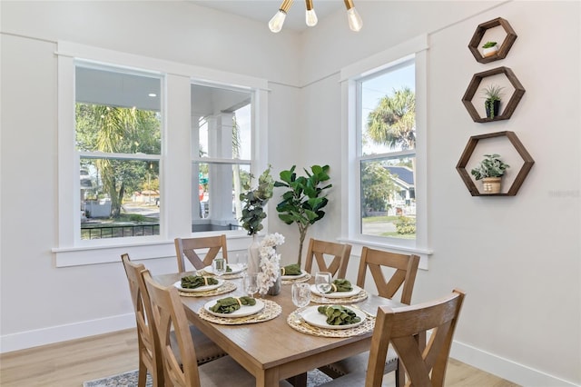 dining space featuring light hardwood / wood-style floors