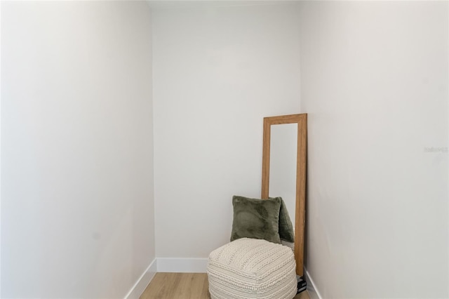 living area with light hardwood / wood-style flooring