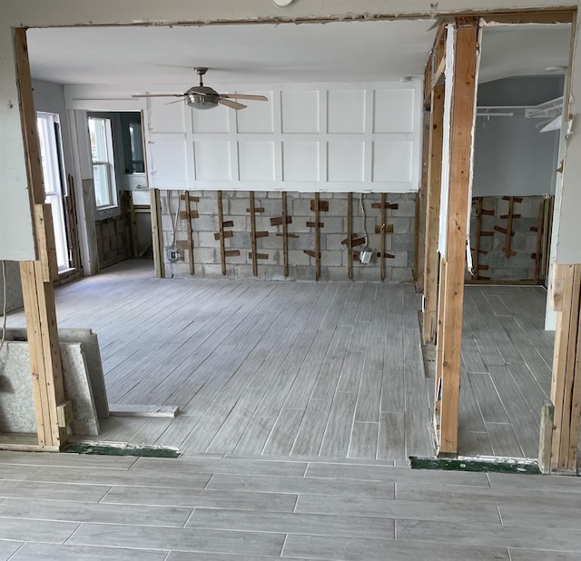 miscellaneous room featuring light hardwood / wood-style flooring and ceiling fan