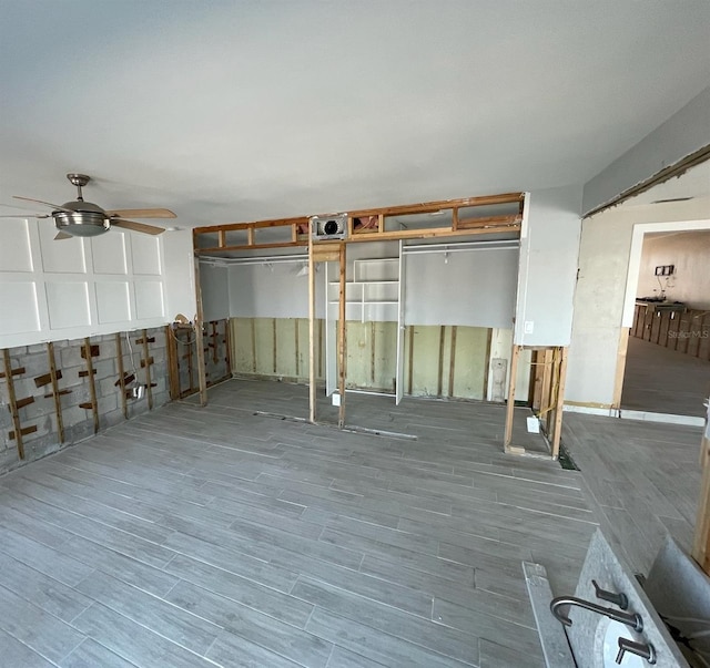 basement featuring hardwood / wood-style floors