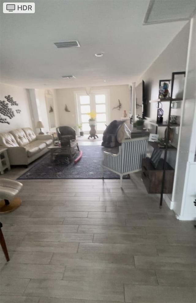 living room with hardwood / wood-style floors