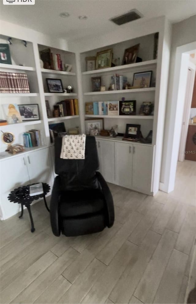 living area featuring light hardwood / wood-style floors