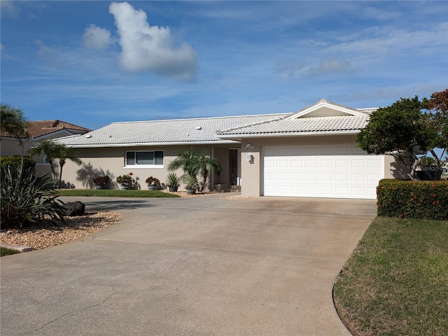 ranch-style home with a garage