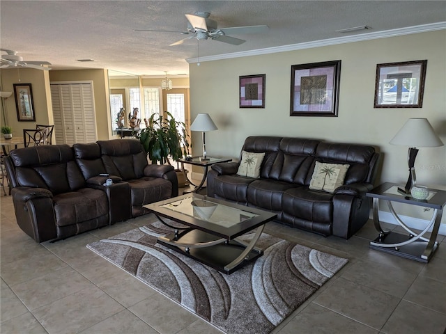 tiled living room with a textured ceiling and ornamental molding