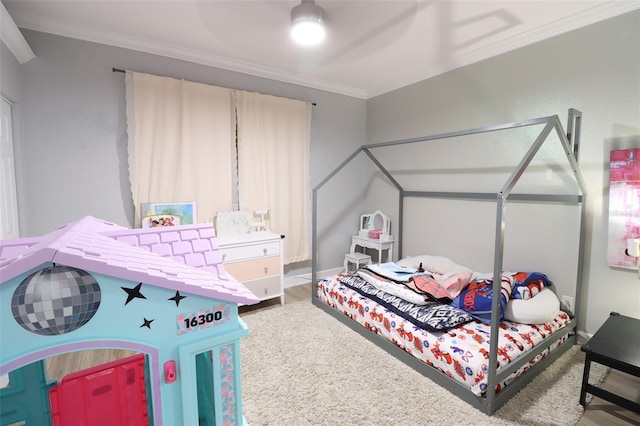 bedroom with ceiling fan and crown molding