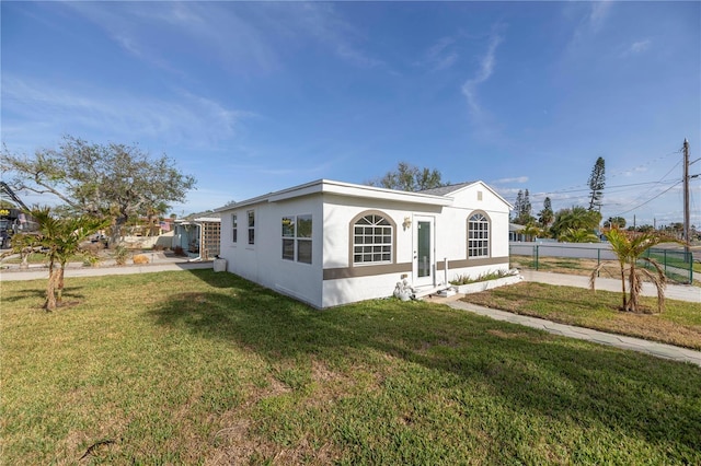 view of front of home with a front yard