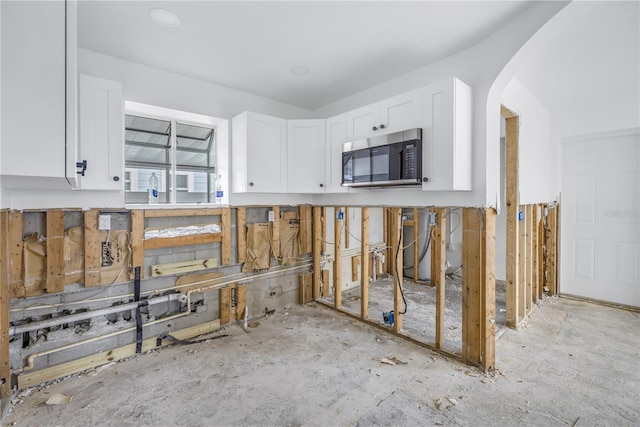 kitchen featuring white cabinetry