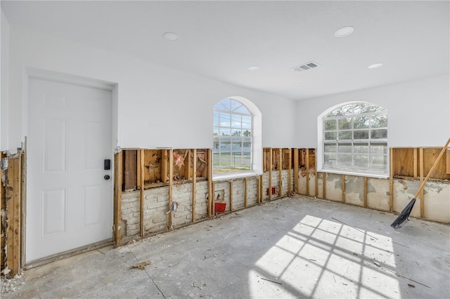 unfurnished room with a healthy amount of sunlight