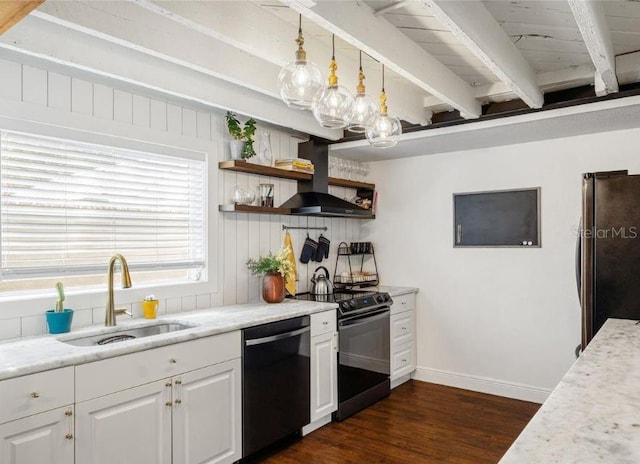 kitchen featuring wall chimney exhaust hood, sink, white cabinetry, decorative light fixtures, and black appliances