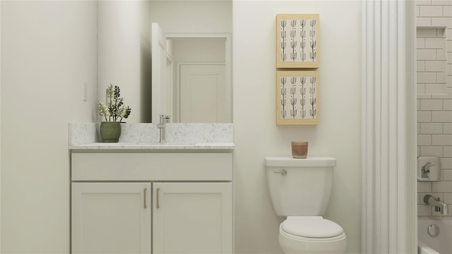 bathroom featuring toilet and vanity