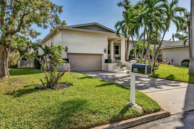 single story home with a front lawn