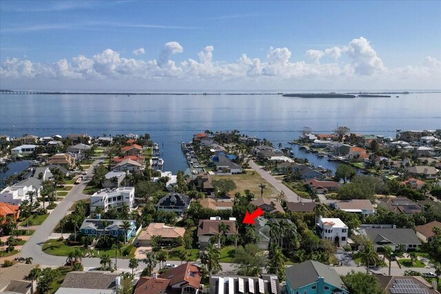 bird's eye view with a water view and a residential view