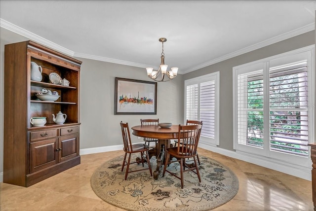 dining space with light tile patterned floors, crown molding, baseboards, and an inviting chandelier