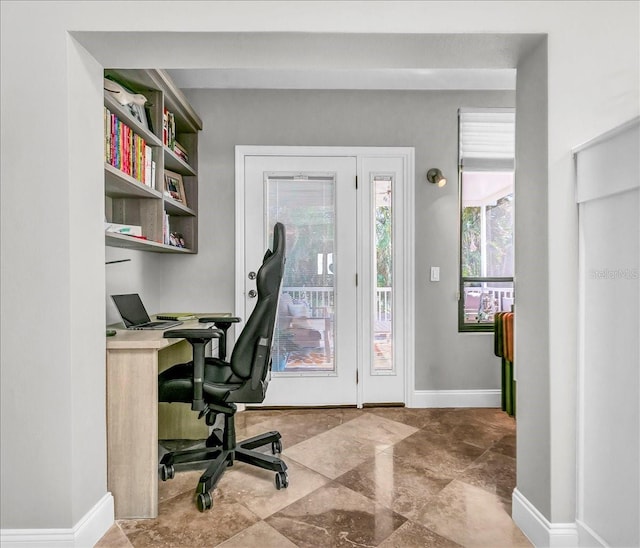 office area featuring baseboards