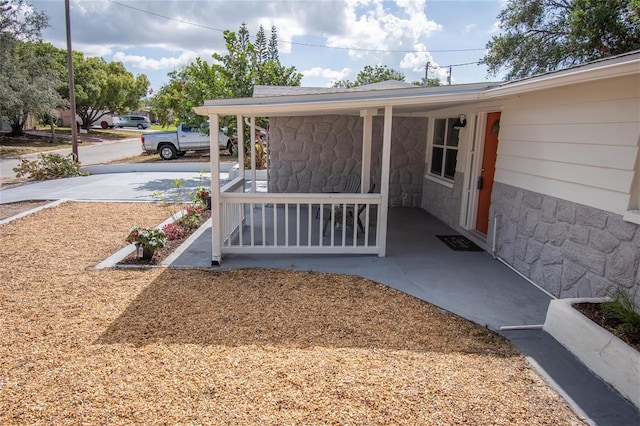 exterior space featuring covered porch