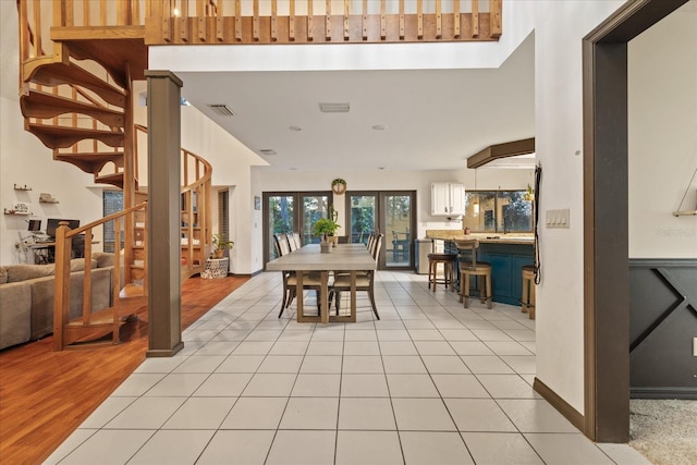 dining space with light wood-type flooring