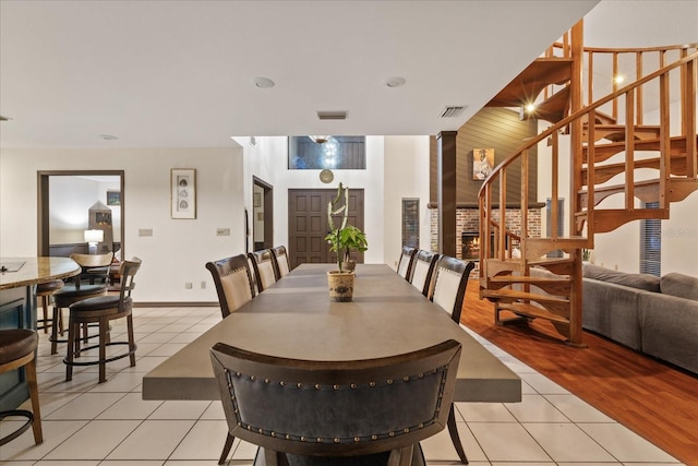 dining space with light tile patterned flooring