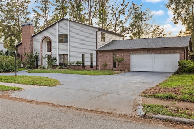 view of front of property with a garage