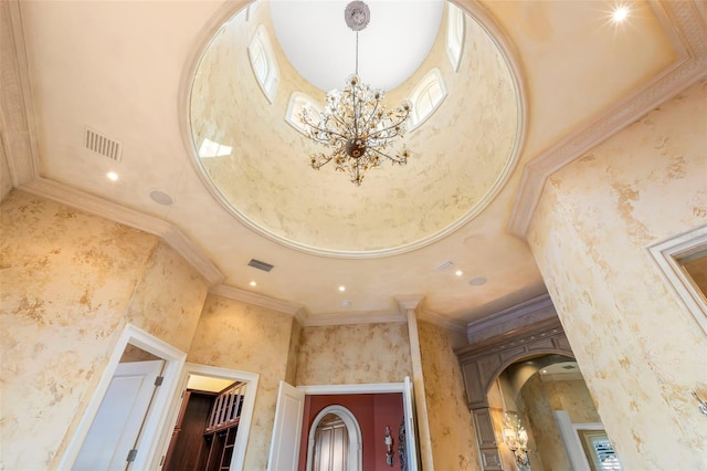 101 12th St E, Tierra Verde, FL 33715 - detailed view of a chandelier, arched walkways, ornamental molding, and recessed lighting