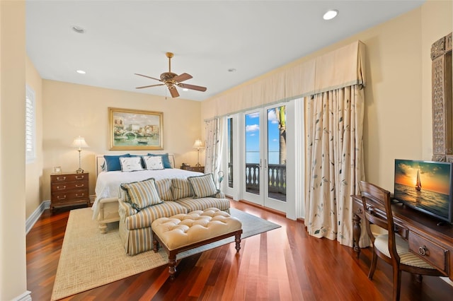 bedroom with access to exterior, ceiling fan, and dark hardwood / wood-style flooring