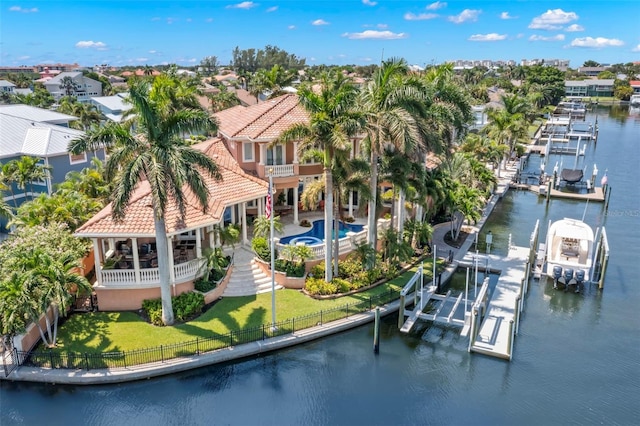 birds eye view of property featuring a water view